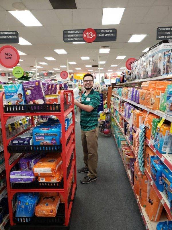 Alex restocking shelves 41619 Mission Empower